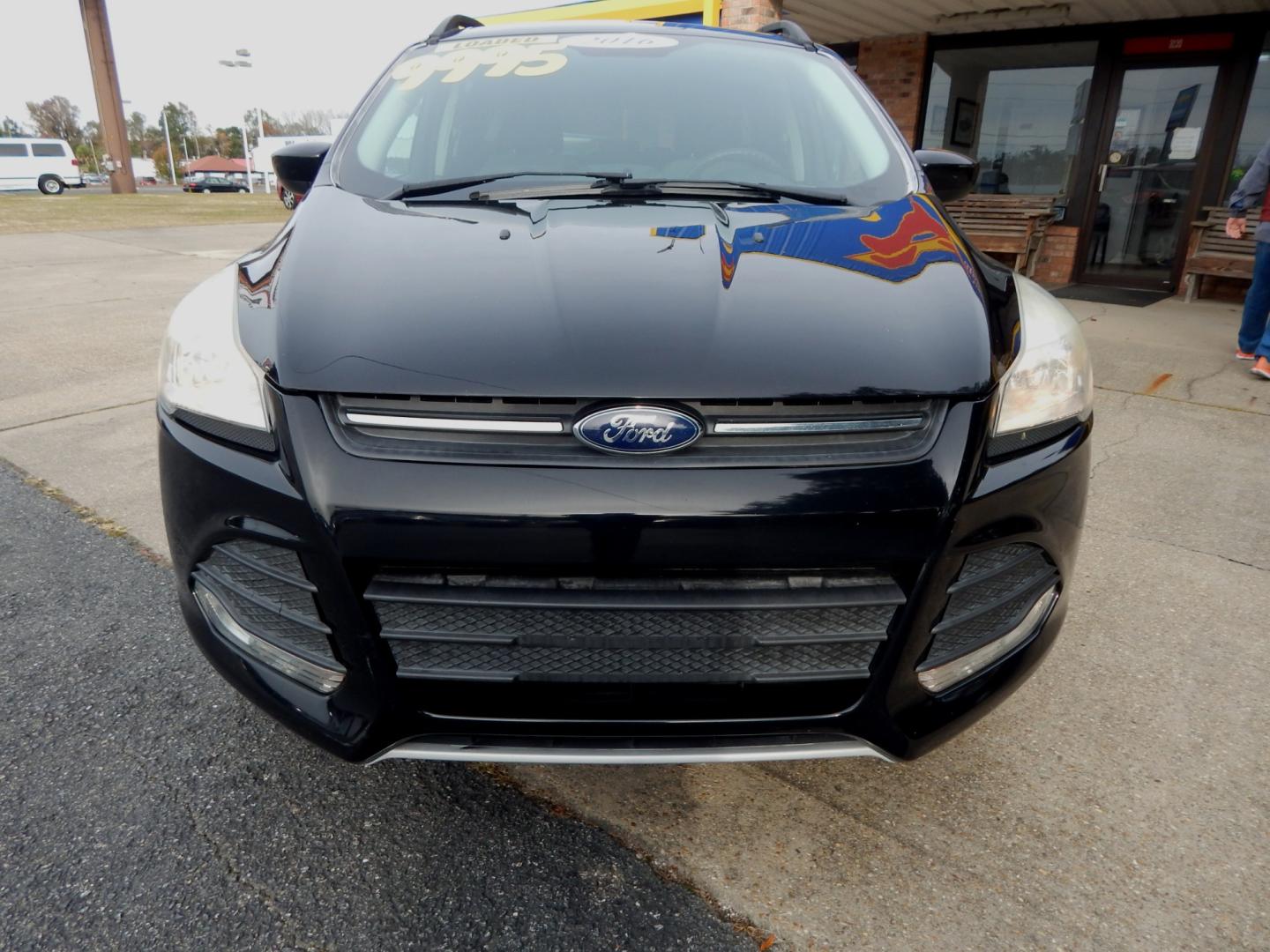 2016 Black /Gray Ford Escape SE (1FMCU0GXXGU) with an 1.6l engine, Automatic transmission, located at 3120 W Tennessee St, Tallahassee, FL, 32304-1002, (850) 575-6702, 30.458841, -84.349648 - Used Car Supermarket is proud to present you with this loaded immaculate 2016 Ford Escape SE. Used Car Supermarket prides itself in offering you the finest pre-owned vehicle in Tallahassee. Used Car Supermarket has been locally family owned and operated for over 48 years. Our Escape SE has been serv - Photo#2